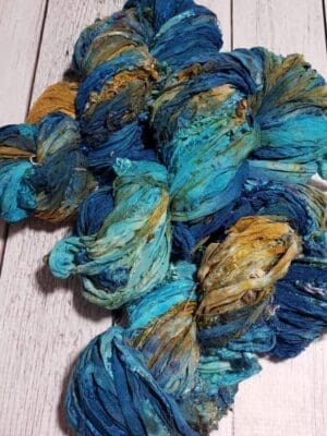 Hand-dyed blue and gold silk bundles