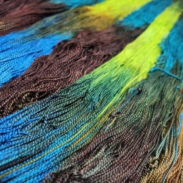 A close up of a colorful yarn.