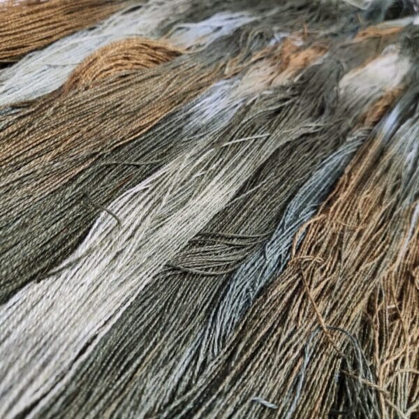 A close up of some brown and gray threads.
