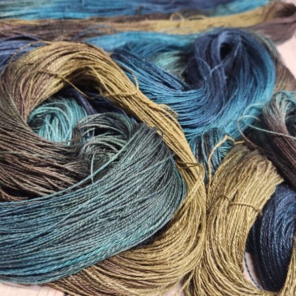 A skein of blue, green, and brown yarn.