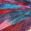 A close up of a bunch of colorful yarn.