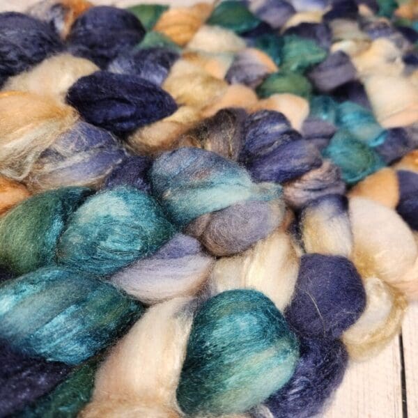 A close up of a pile of blue and white yarn.