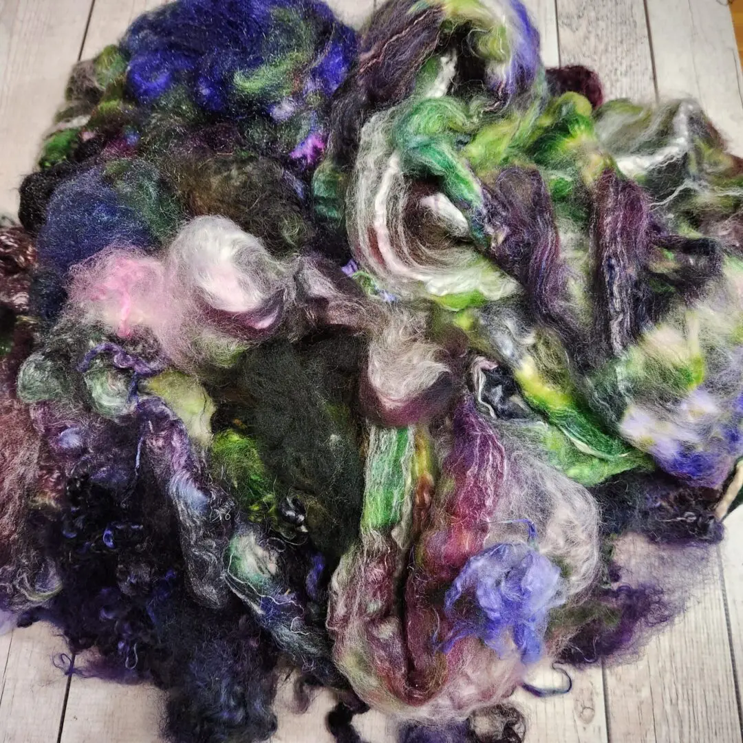 Multicolored wool fiber for spinning and felting.