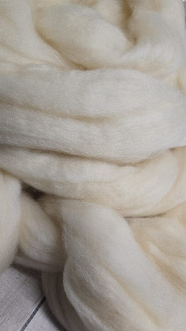 Soft cream wool roving close-up