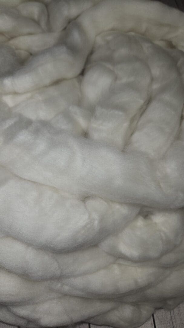 Thick cream wool roving twisted bundle