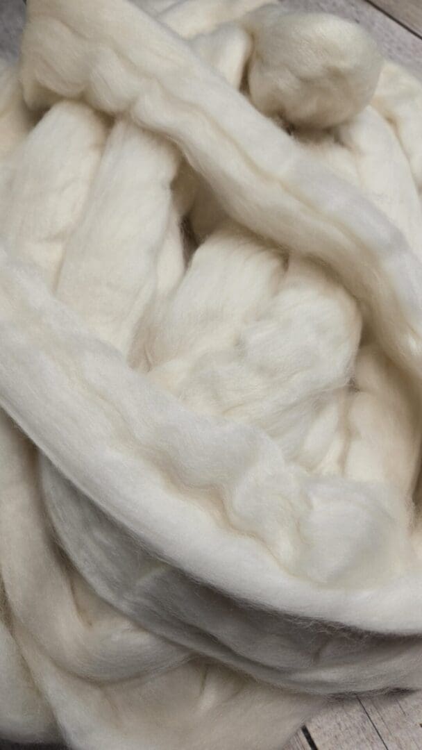 Soft cream wool roving braided in thick strands