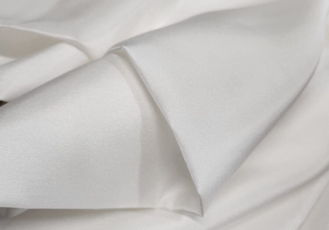 A close up of a white piece of fabric.